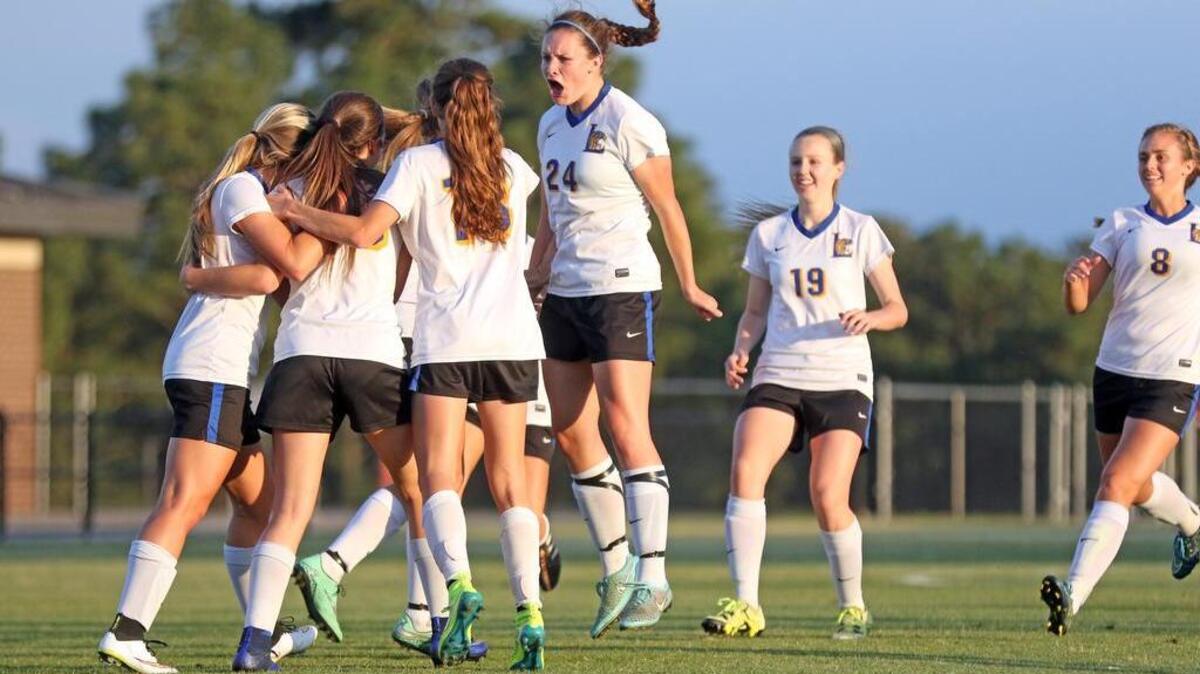 Lexington celebrates Megan Classer’s goal Friday night against Wando.