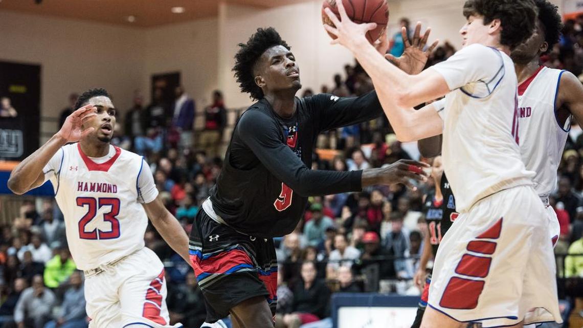 Guard Jalek Felton, center, will play his senior season at Gray Collegiate Academy in the Midlands.
