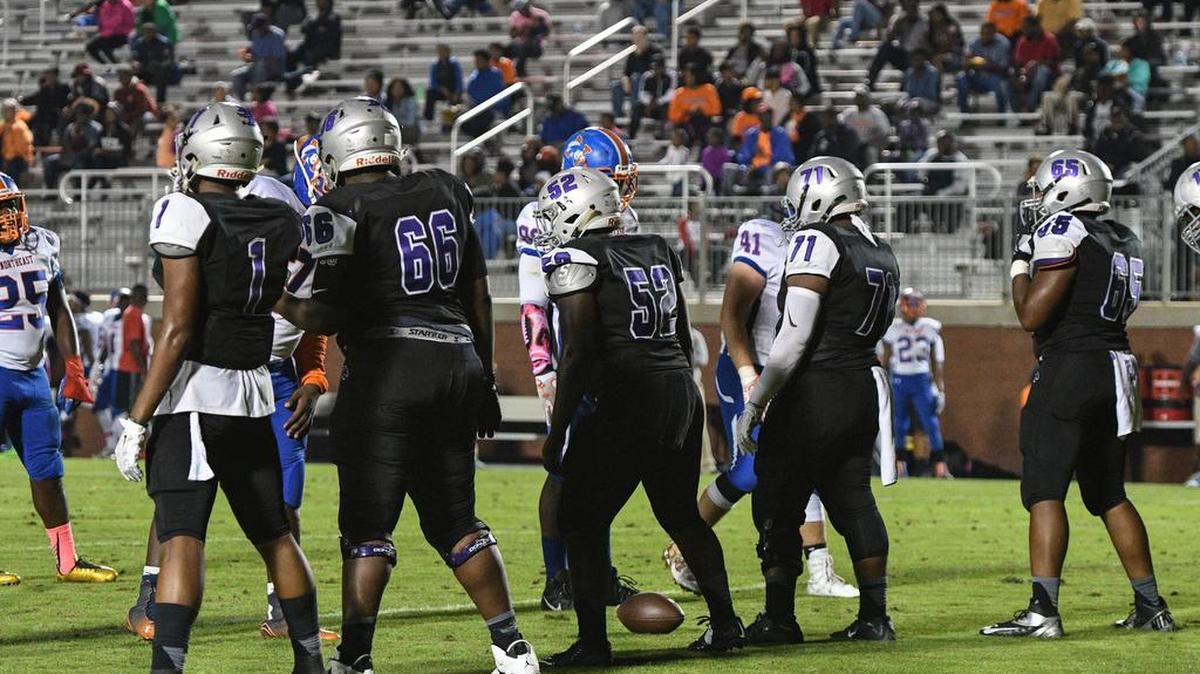 Ridge View's defensive line gets ready for a play against Richland Northeast.