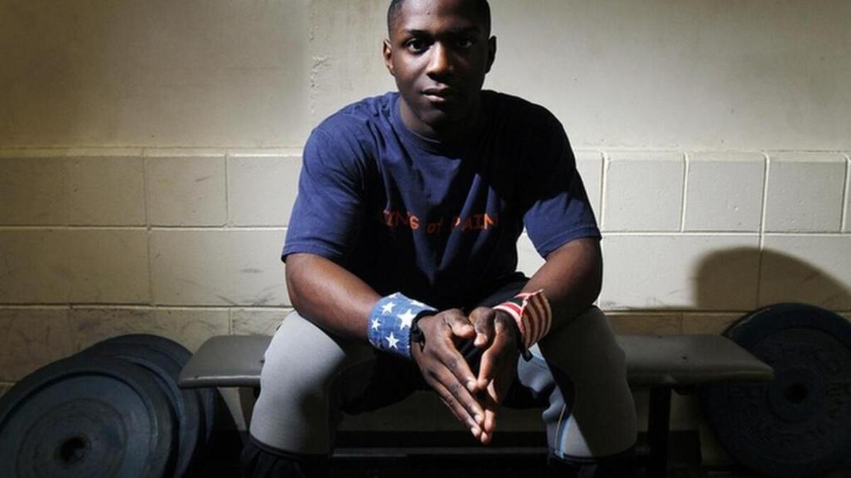 
Beaufort's C.J. Cummings sits for a portrait at the Beaufort Middle School weight room on December 10, 2014. Cummings will travel to compete in the American Open. The 14-year-old this year set an American record for his 62-kg weight class. He now competes at 69 kg.
