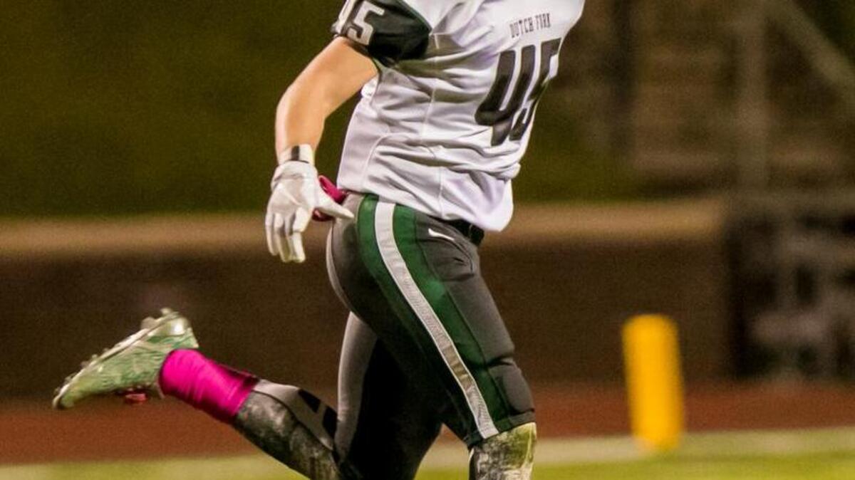 Dutch Fork's Taylor Wiggins celebrates an interception during the game between Dutch Fork at Spring Valley High School.