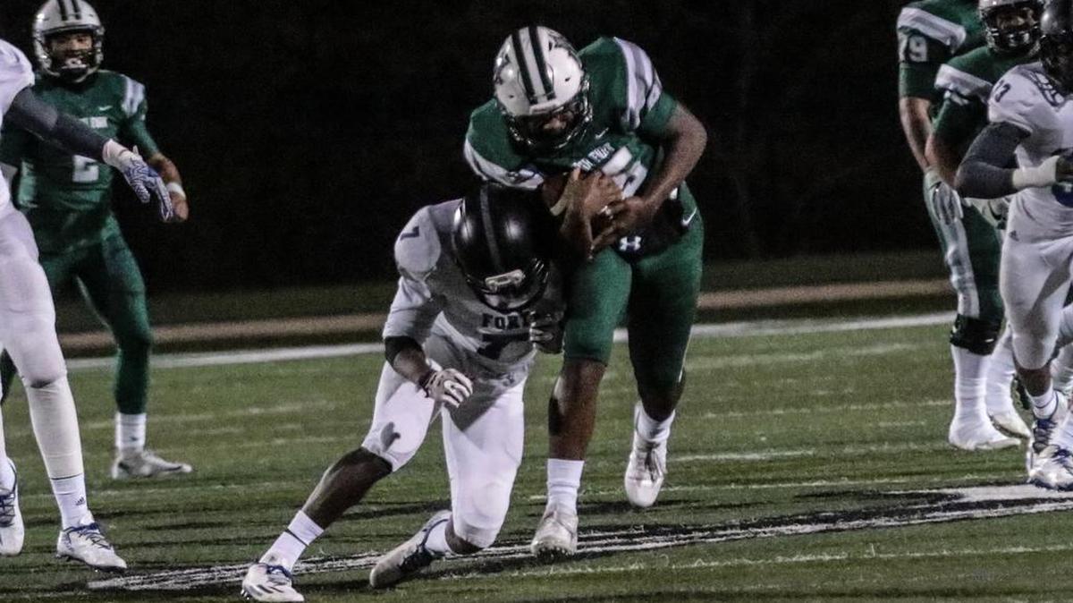 Bryson Cannon brings in a catch during Friday night's 5A Lower State Semifinal game between Dutch Fork High School and Fort Dorchester.