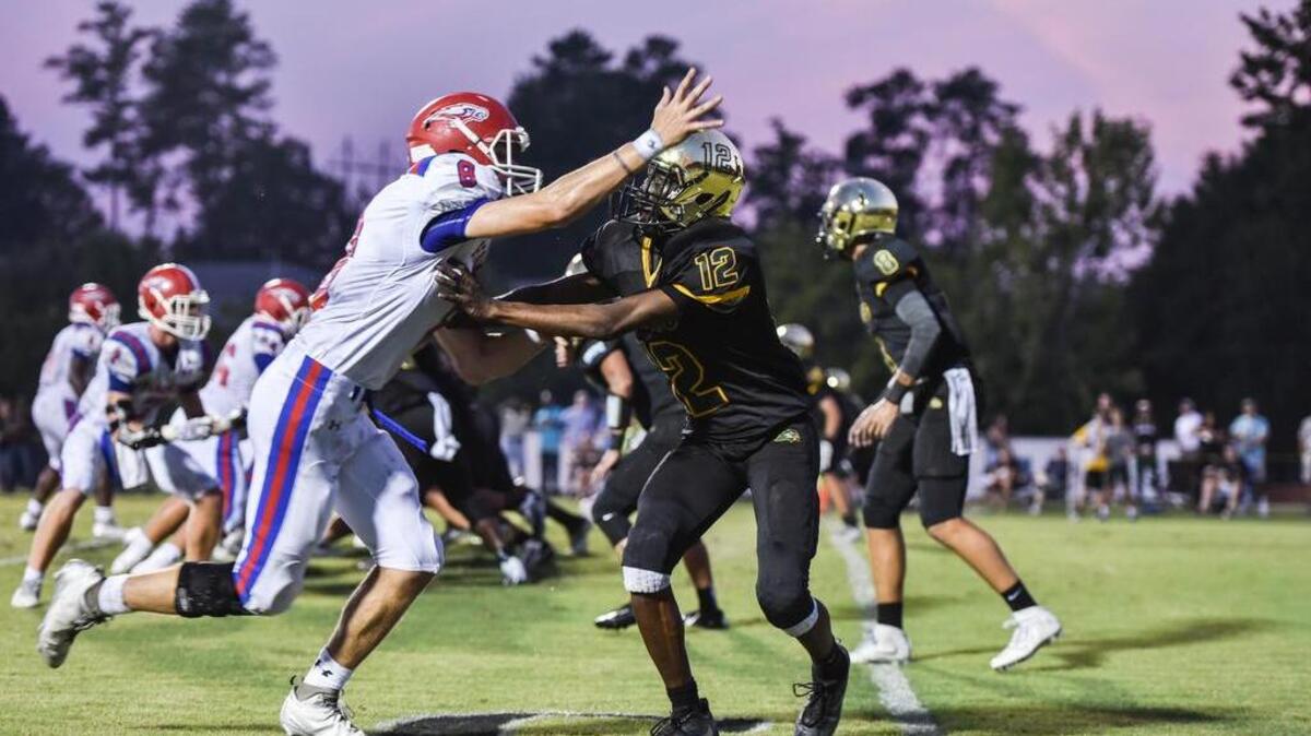 Hammond’s Jack Theodore battles with Ben Lippen’s Ryan McCray on a play during the game.