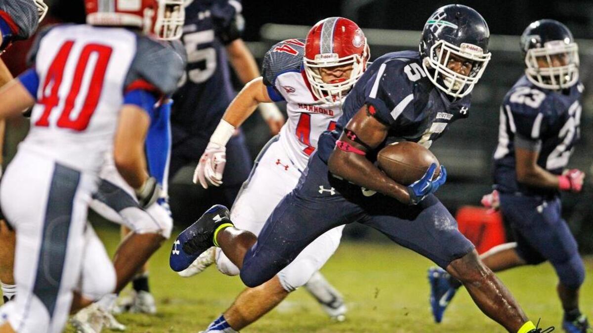 Heathwood Hall’s Brandon Hill, running against Hammond, is a finalist for a national award.