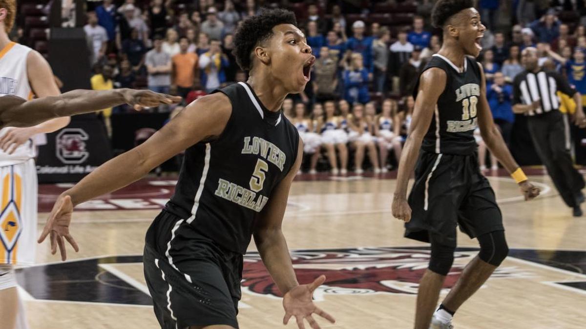 Lower Richland players celebrate their Class 4A State Championship win over Wren on Saturday.