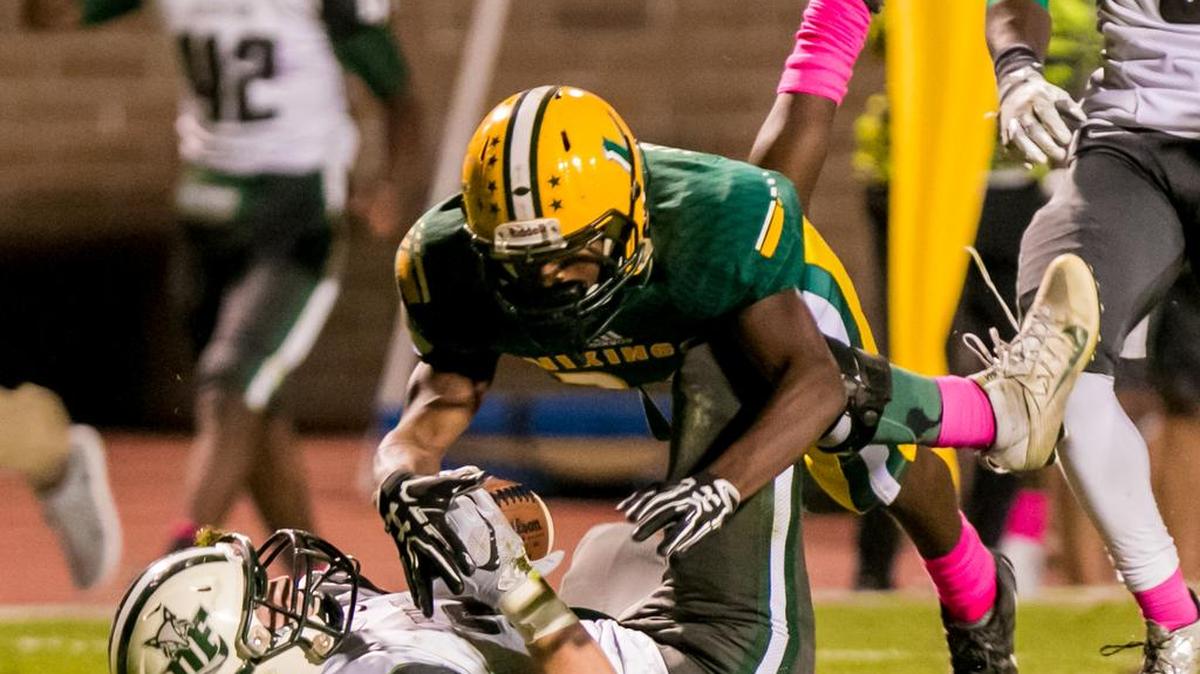 Dutch Fork's Blake Branham comes up with a game-sealing interception against Spring Valley last year. The two teams meet Friday with Region 5-5A title on line.