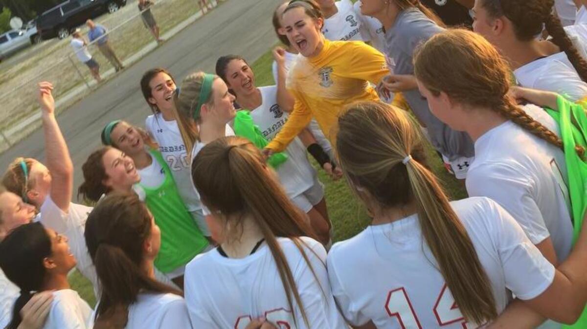 Cardinal Newman celebrates its win against Hammond in the SCISA 3A girls soccer state semifinals.