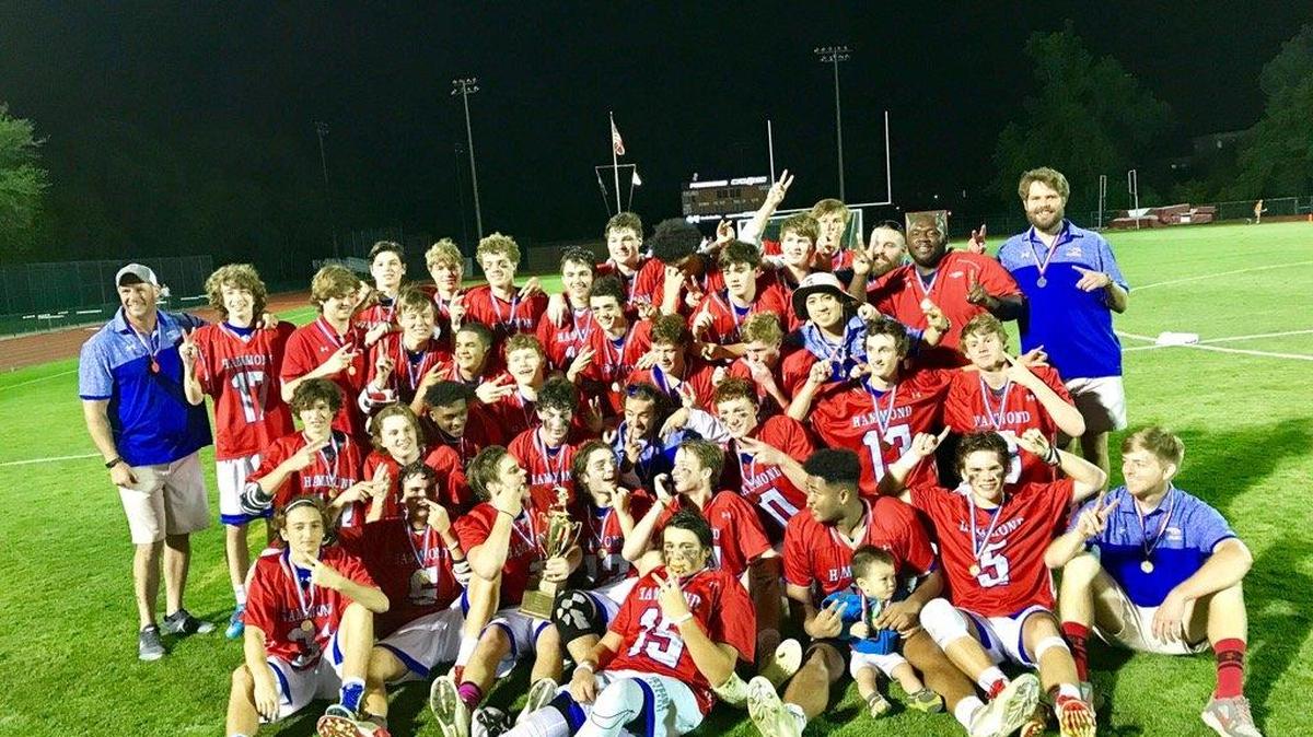 Hammond celebrates its SCISA boys lacrosse state championship.