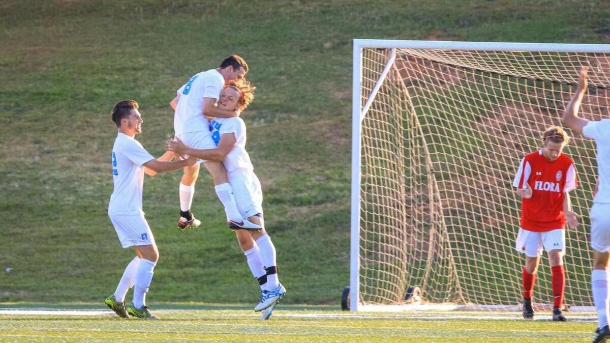 Chapin’s Caleb White (19) celebrates his goal with Cooper Woodham (8) and Smith Dawsey during the Class 3A Upper State boys soccer championship. Chapin defeated A.C. Flora 4-1.