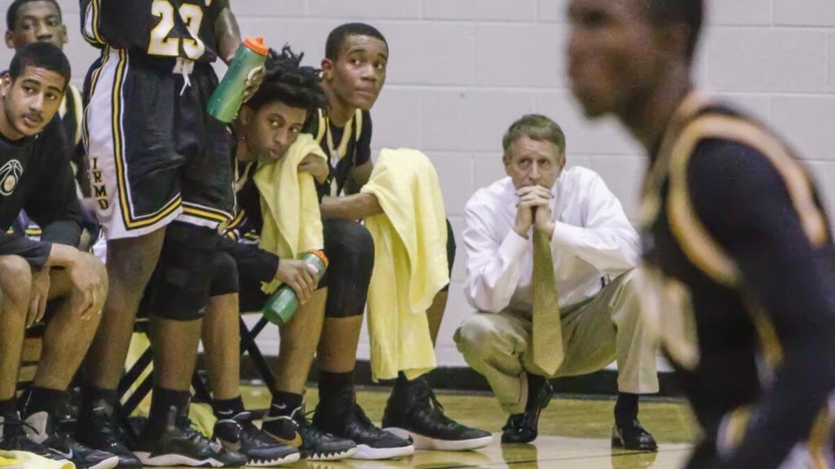 Irmo basketball coach Tim Whipple watches his team while playing Newberry, which was his 700th career win. Irmo plays Blythewood in the playoffs.
