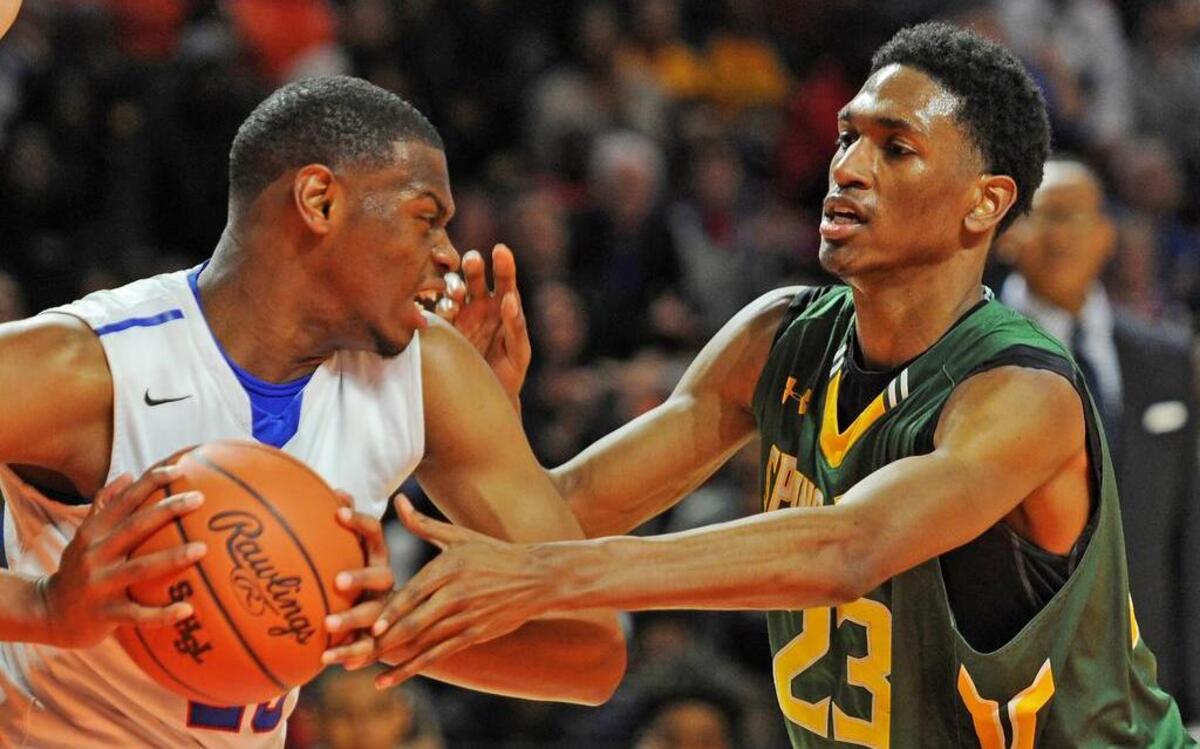 Spring Valleyâ’s Jordan Bruner (23) defends against Byrnes’ Tyrique Glenn at the Class 4A Boys Upper State Basketball Championship in 2016.