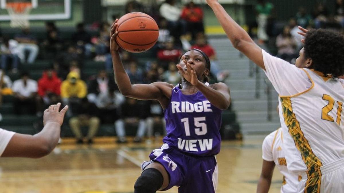 Ridge View's Erica Tisdale (15) drives the ball to the goal against Spring Valley this week.