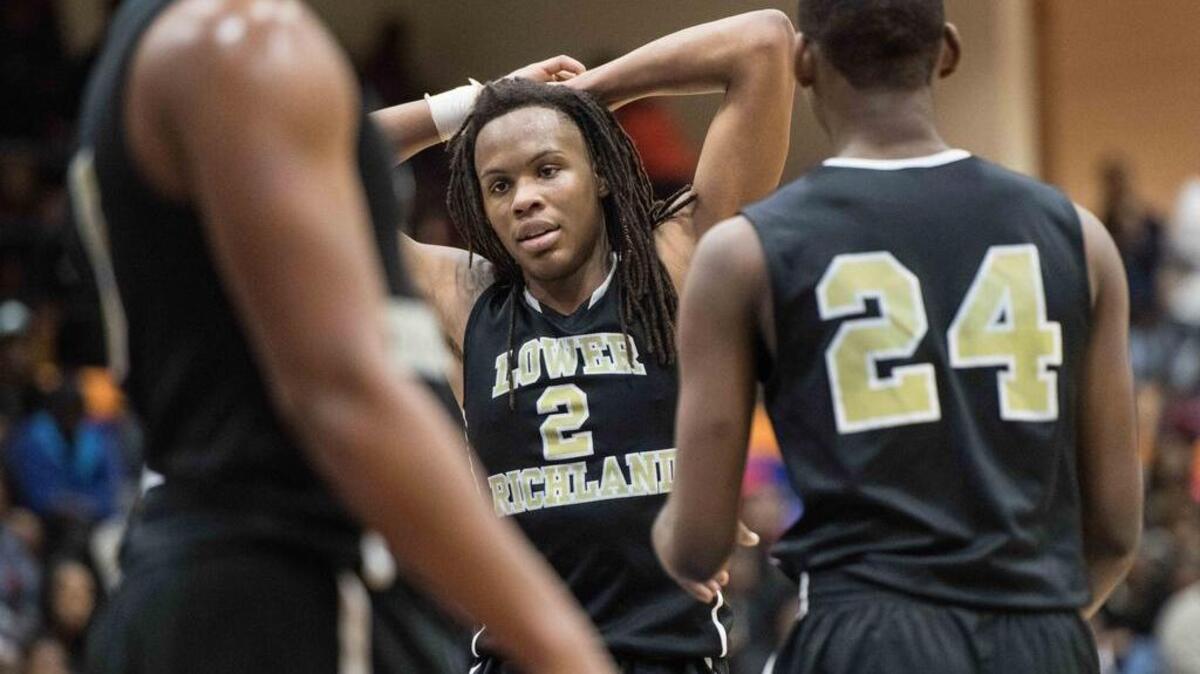 Christian Brown (2) reacts after a play against Porter Gaud during the Chick-fil-a basketball tournament at Richland Northeast High School on Dec 20, 2017. Brown, who now plays at Oak Hill (Va.), took an unofficial visit to South Carolina over the weekend.