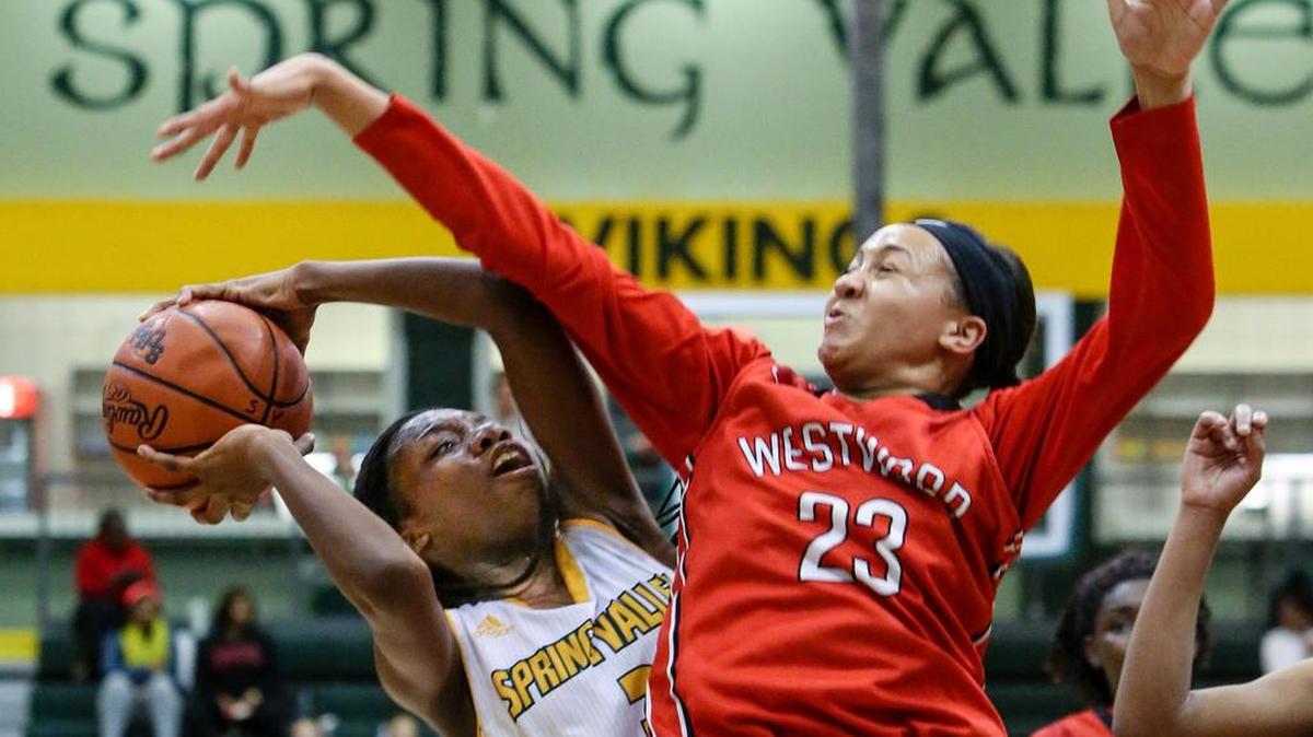 Westwood's Mya Belton goes up for a block against Spring Valley last season. Westwood moved up to No. 1 in Midlands Top 10 polls this week.
