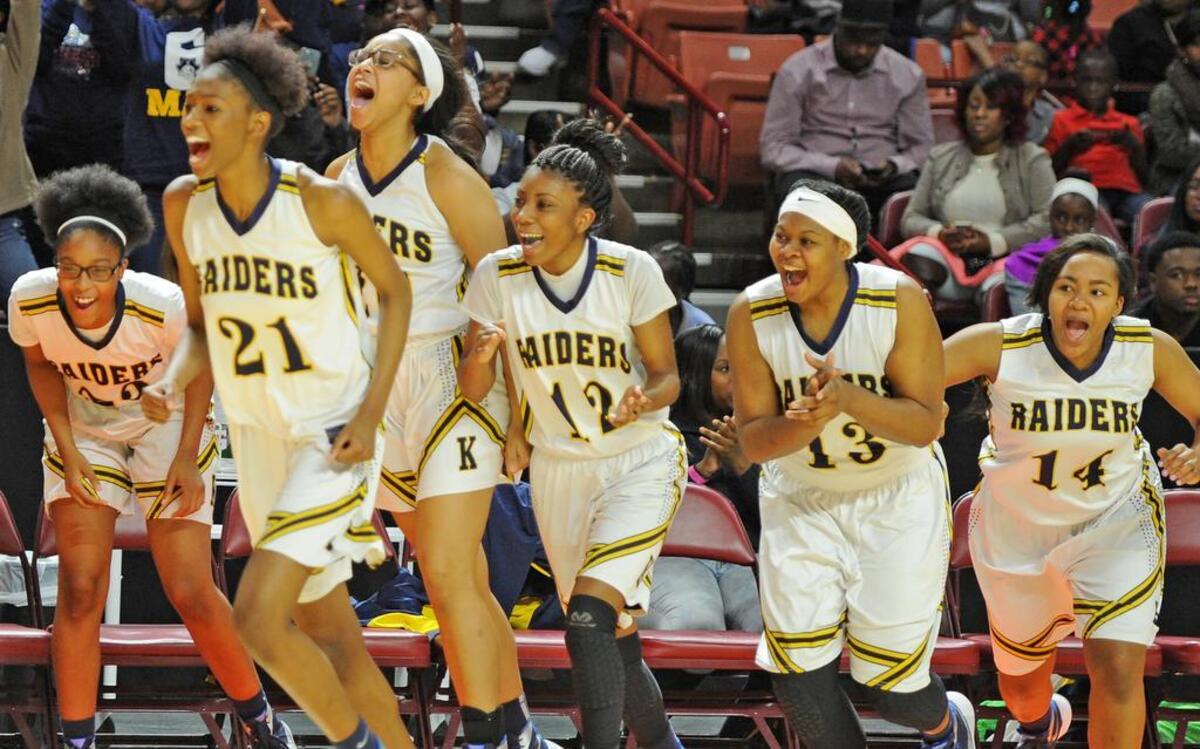 The Keenan girls celebrate Saturday’s Class 2A Girls Upper State title win over Newberry at Bon Secours Wellness Arena in Greenville. Keenan advances to next weekend’s state title game in Columbia.