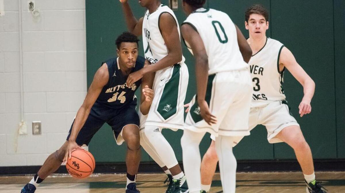 Blythewood’s Trae Churn drives to the hoop against Dutch Fork on Friday.