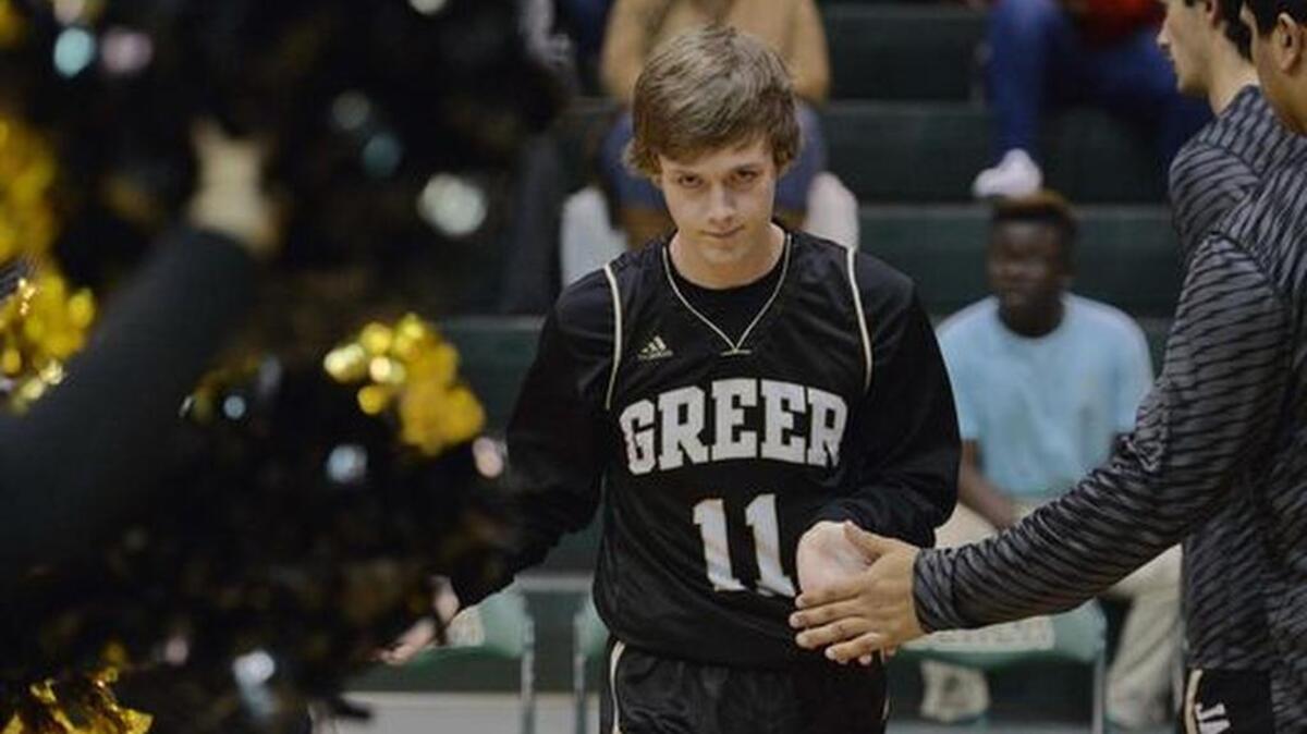 Nathan Moore was a starting guard and the second-leading scorer for the Greer High Yellow Jackets.