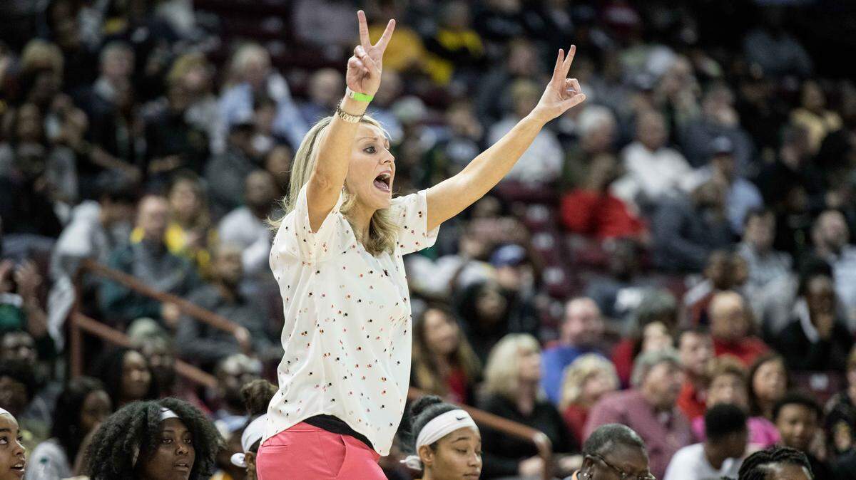 Spring Valley coach Megan Assey communicates with players during the Class 5A Girls state championship game. Assey was named USA Today's South Carolina Girls Basketball Coach of Year.