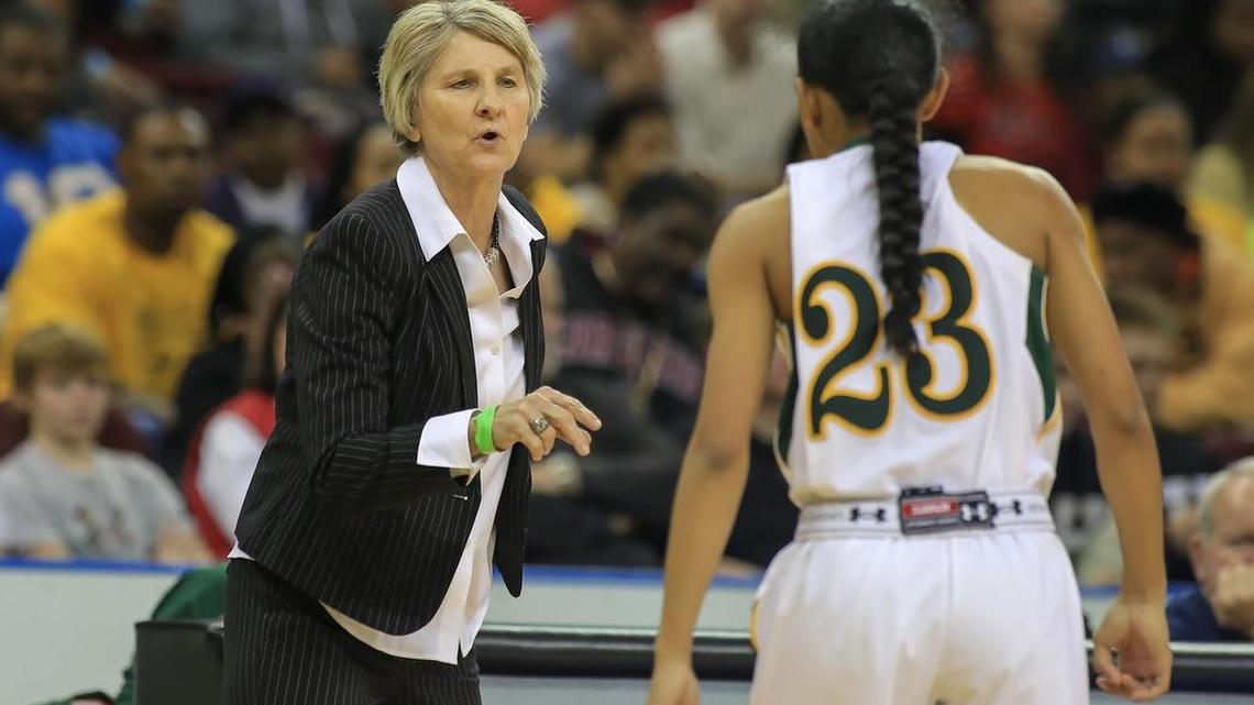 Spring Valley head coach Anne Long coaches Dominique Hill during the second half of the State Championship Friday at Colonial Life Arena.