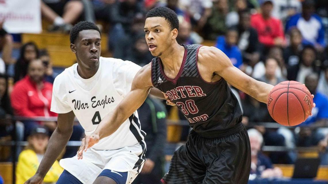 Porter Gaud guard Josiah James (30) dribbles the ball against Gray Collegiate forward Juwan Gary (4) during the Chick-fil-a Classic at Richland Northeast High School Friday, Dec. 22, 2017, in Columbia, S.C.