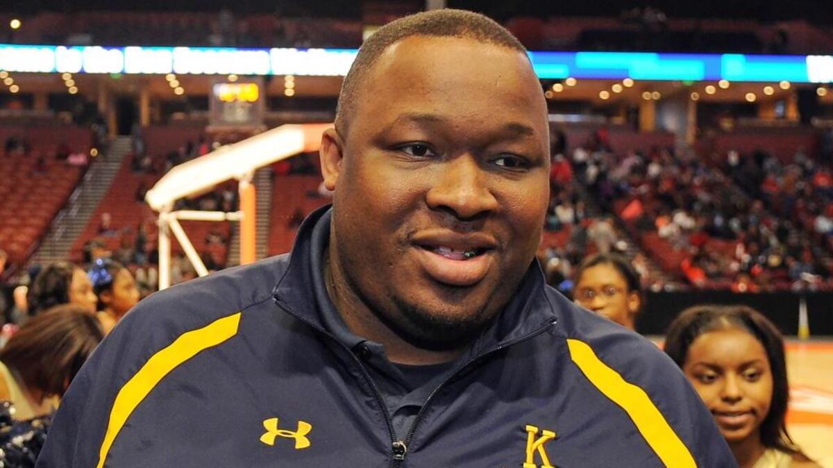 Keenan coach Reggie McLain is named The State's Coach of the Year after leading the Raiders to the Class 2A title.