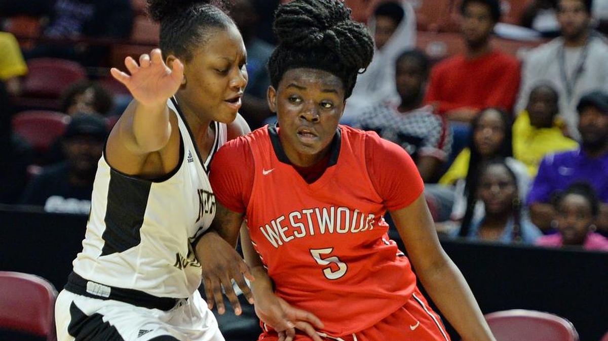 Westwood’s Unique Drake (5) drives the baseline as North Augusta’s J’Mani Ingram (12) dedends.Westwood and North Augusta met in the Upper State Basketball Championships Friday night, February 23, 2018 at Bon Secours Wellness Arena in Greenville.