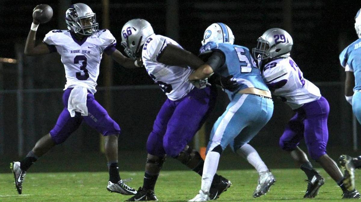 
Ridge View quarterback Tre' High (3) throws a pass against South Florence on Thursday.
