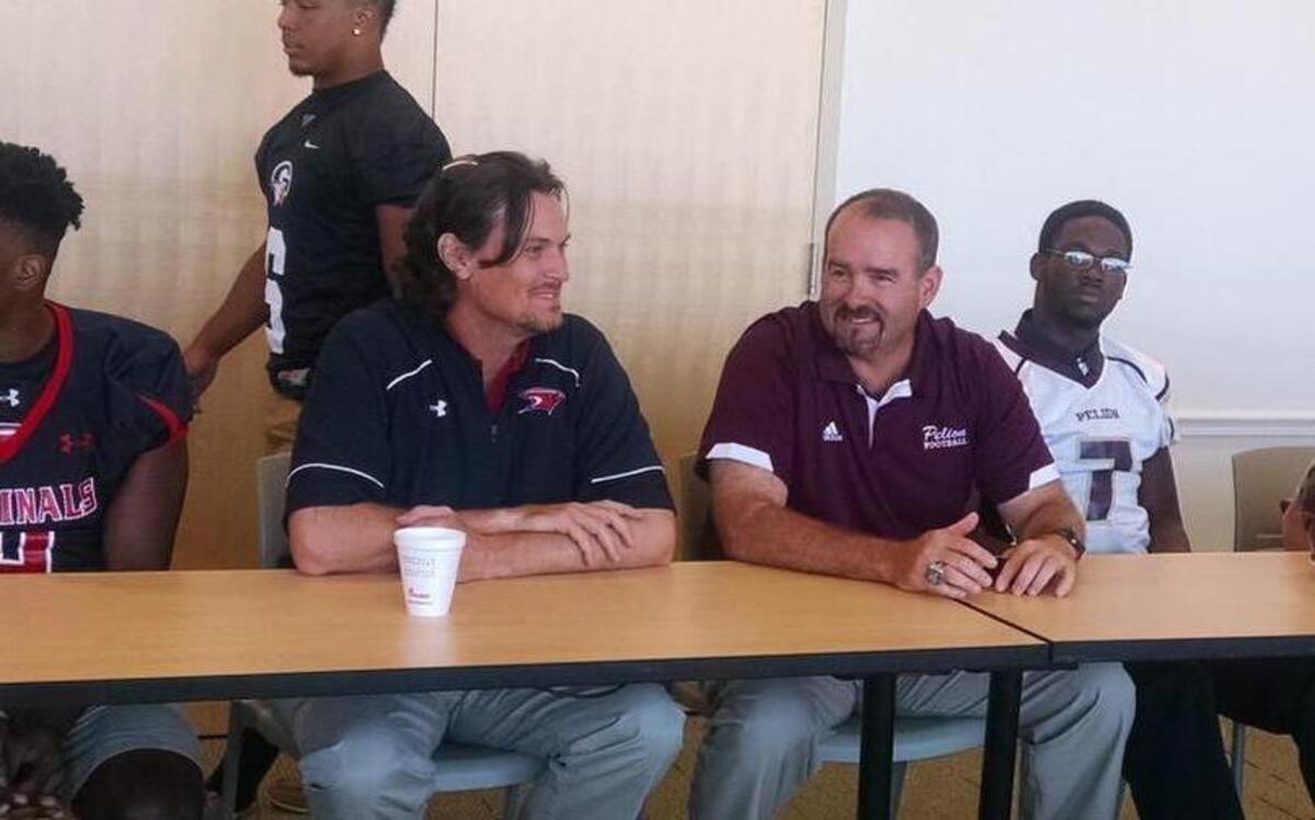 
First-year coaches Doug Dutton of Cardinal Newman and Dann Holland of Pelion.
