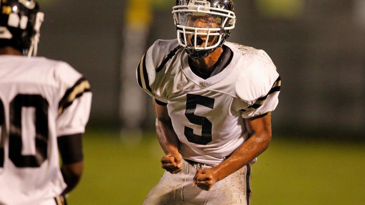 Camden's Sterling Felder celebrates a defensive stop against A.C. Flora at Memorial Stadium on Oct. 1. Felder died Monday from injuries suffered in a car accident Nov. 13.