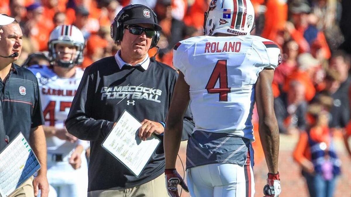 
South Carolina wide receiver Shaq Roland (4) with coach Steve Spurrier in 2014
