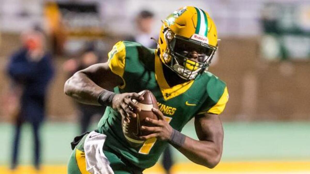 Spring Valley Vikings quarterback DeQuandre Smith (4) scrambles for a touchdown against the Nation Ford Falcons.