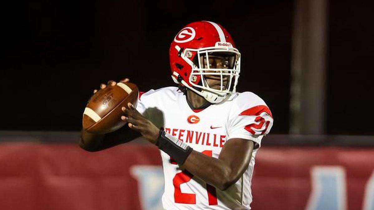 Greenville Red Raiders quarterback Prometheus Franklin (21) passes against the AC Flora Falcons in a playoff game Friday, November 12, 2021, at Memorial Stadium in Columbia, SC.