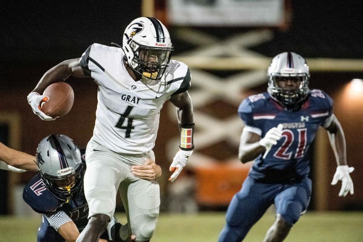 Gray Collegiate’s Omarion Dollison runs with the ball against White Knoll’s Chase Rivers during the first quarter at White Knoll High School Friday, Sept. 20, 2019, in Irmo, S.C.