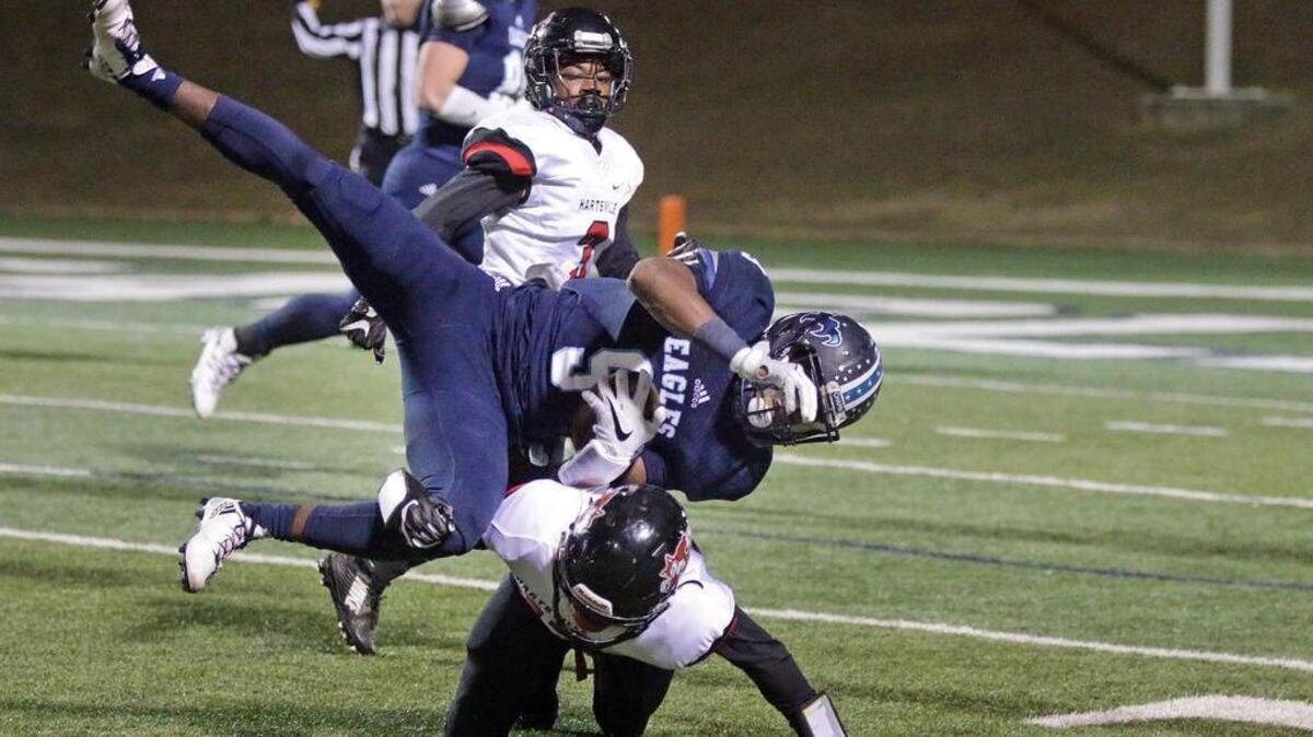 Chapin’s Xzavion Gordon is upended on a reception Friday night against Hartsville.