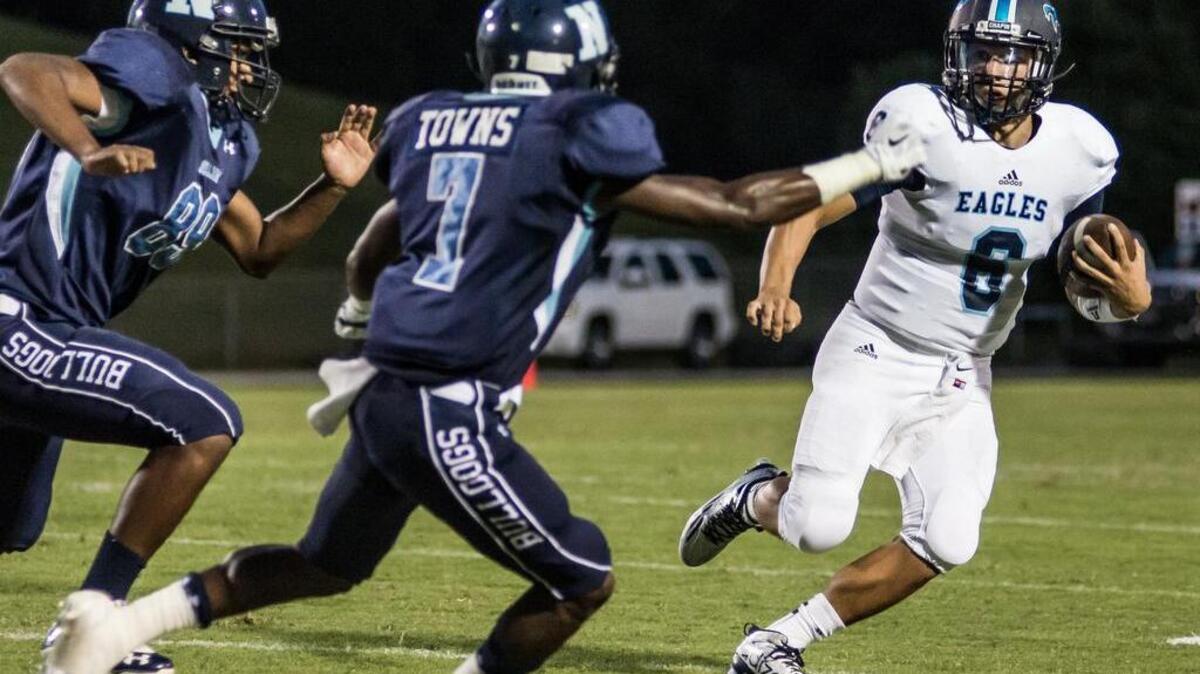 
Chapin quarterback Logan Bailey is forced out of bounds by Newberry's Zyearrious Towns during the Eagles’ victory Friday.

