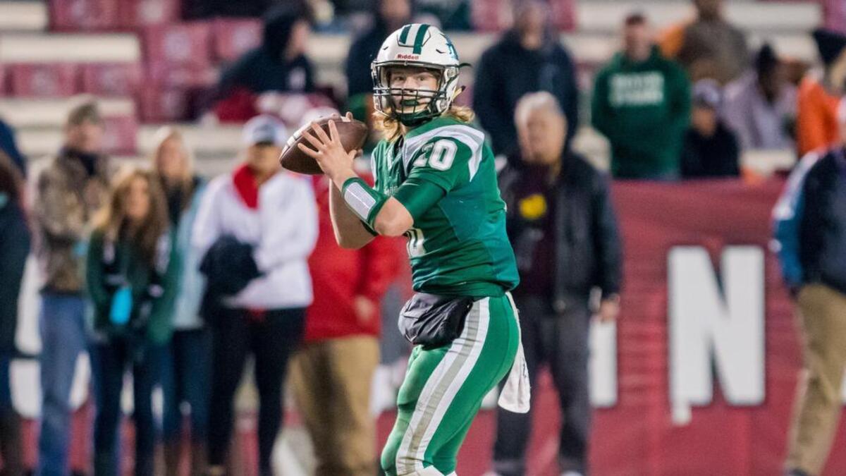 Dutch Fork Silver Foxes quarterback Tyler Olenchuk (10) passes in the second half of the Dutch Fork Silver Foxes 59-20 defeat of the TL Hanna Yellow Jackets in the AAAAA State Championship game at Williams-Brice Stadium.