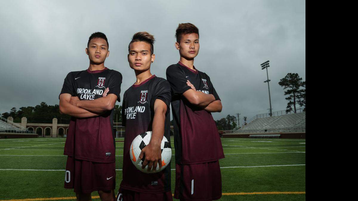 
Brookland-Cayce soccer team features three players who are originally from Burma and came here from a refugee camp in Thailand. They are, from left, Heh Htoo, Sun Jday and Gler Taw.
