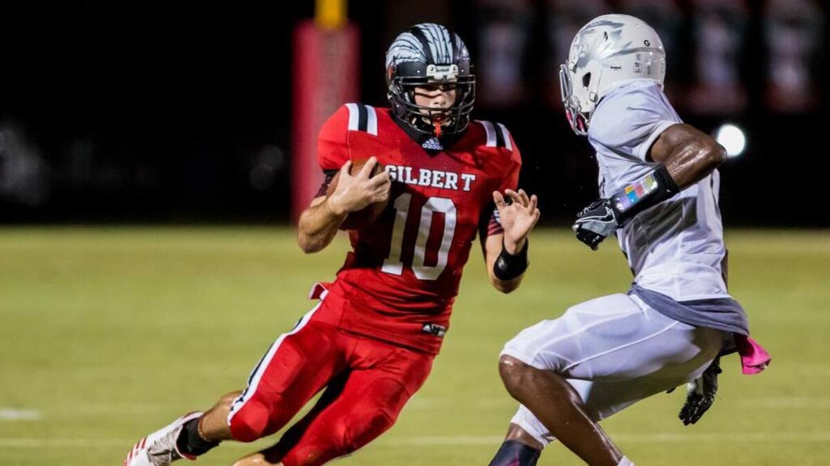 Gilbert Indians Cody Temples (10) is brought down by Brookland-Cayce Bearcats Latrell Jamison (10) during a game this season. Gilbert reamined No. 2 in final regular-season Midlands Top 10 poll.