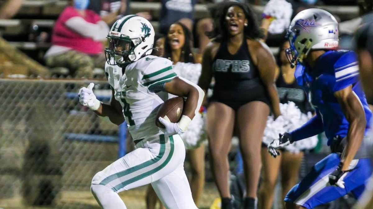 Dutch Fork Silver Foxes Jarvis Green (4) rakes a reception for a touchdown against the Byrnes Rebels.