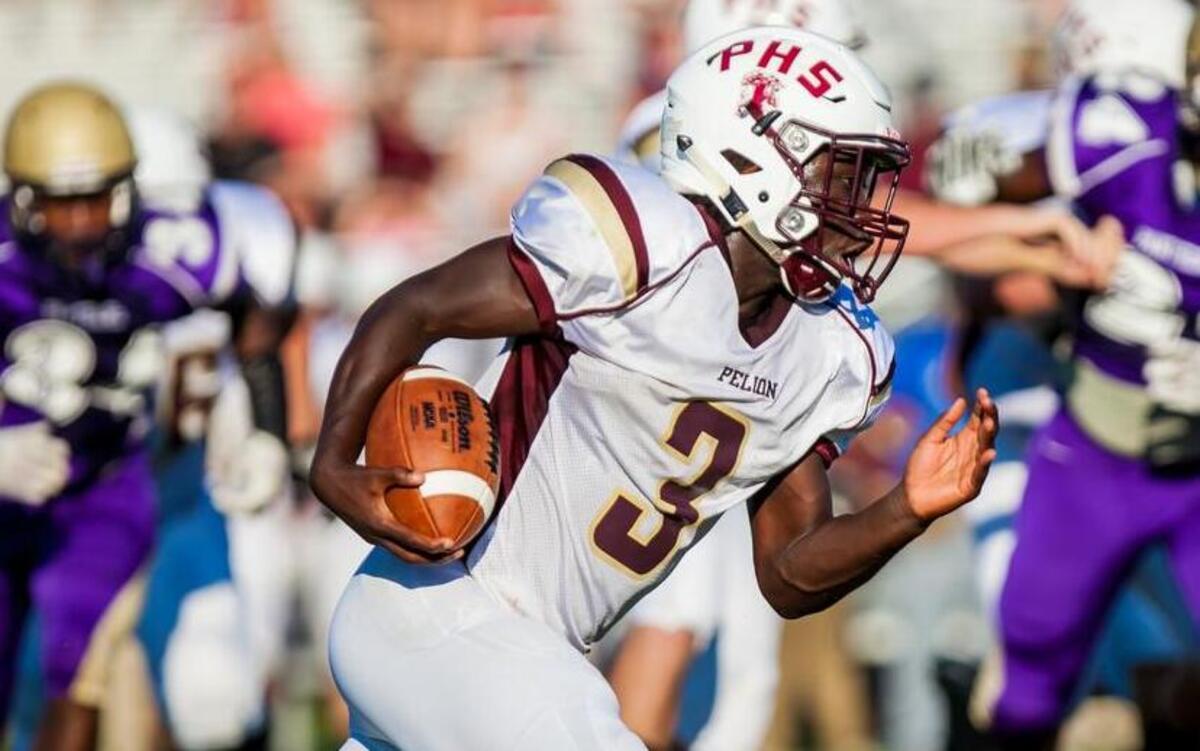 Pelion tailback Richard Kollie rushes against Batesburg-Leesville during the jamboree at White Knoll High School on Friday.