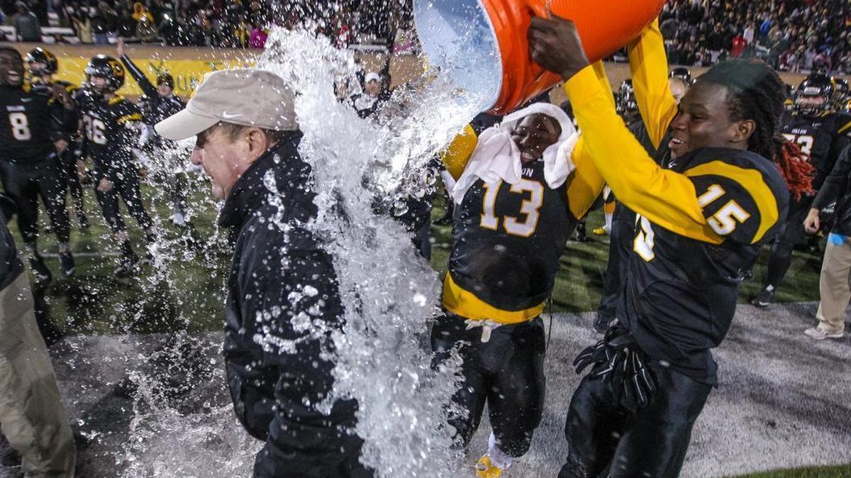 Dillon coach Jackie Hayes gets dowsed after his team defeated Newberry in the 2015 Class 2A Division I state football championship game. Hayes will be the head coach for South Carolina in 2018 Shrine Bowl.