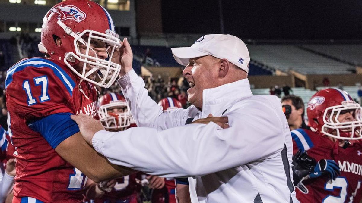 Hammond’s Sean Hutchinson celebrates with coach Erik Kimrey after defeating Pinewood Prep in the SCISA Class 3A state championship game Saturday.