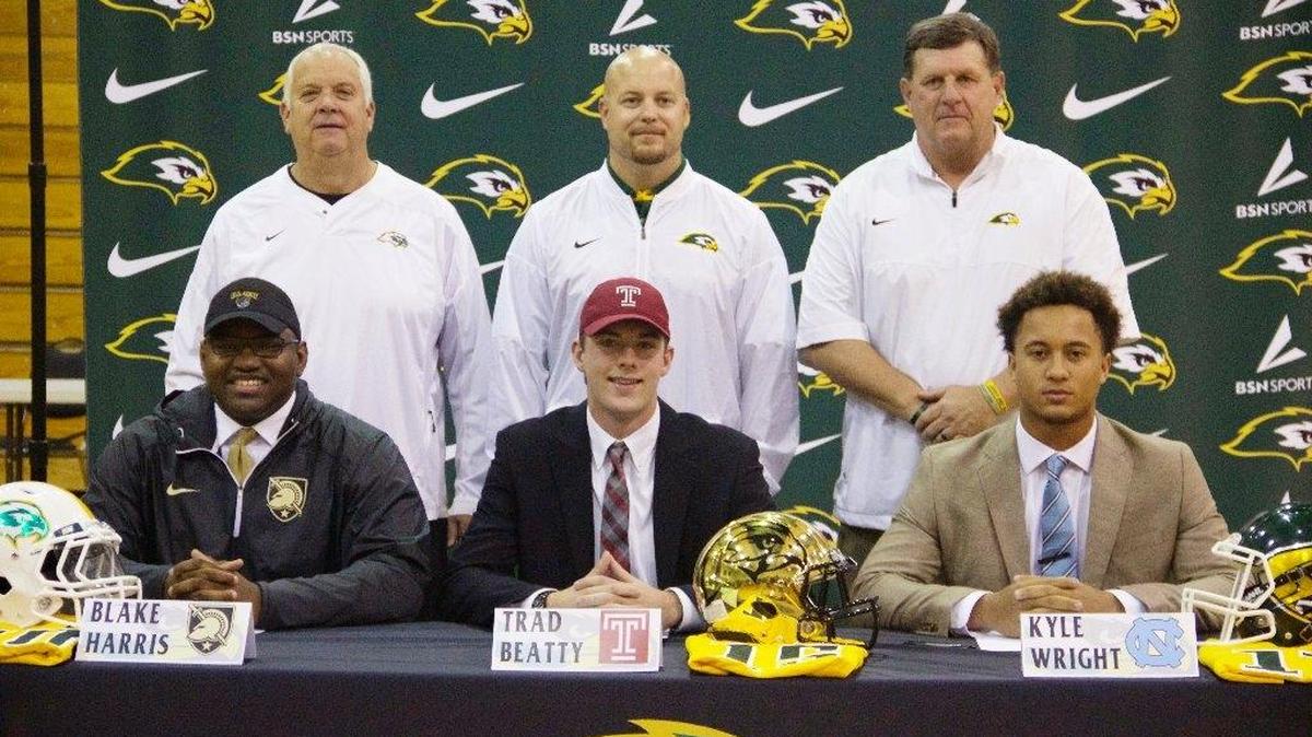 Ben Lippen’s Blake Harris, Trad Beatty and Kyle Wright sign their letters of intent Wednesday.