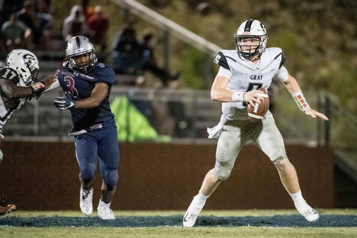 Gray Collegiate senior quarterback Hunter Helms crumbles from the pocket against White Knoll at White Knoll High School Friday, Sept. 20, 2019, in Lexington, S.C.