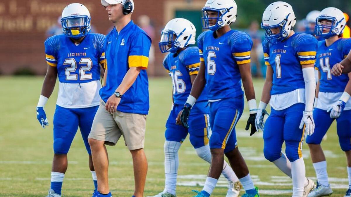 Lexington coach Josh Stepp directs his team against Gilbert during the jamboree at White Knoll High School on Aug. 12. The Wildcats remain the top-ranked team in the Midlands high school football poll.