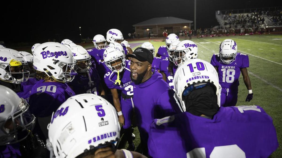 Ridge View High School players huddle up during Ridge View’s game against visiting Spring Valley on Friday, October 8, 2021.