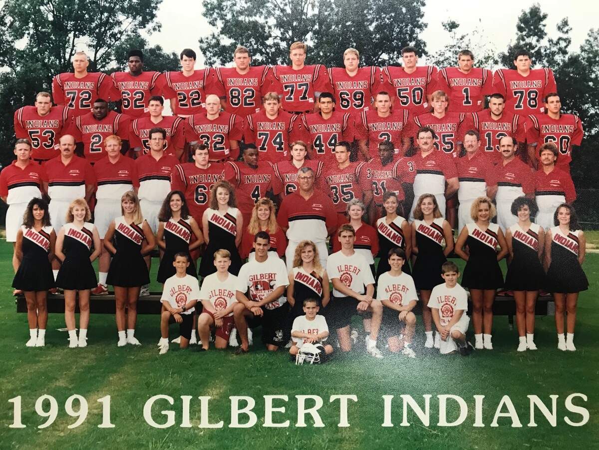 Current Gilbert coach Chad Leaphart (53) and Lexington coach Perry Woolbright (ball boy, bottom left) appear in this 1991 Gilbert High School Football photo. Gilbert and Lexington meet for the first time in football Friday, Aug. 31, 2018.