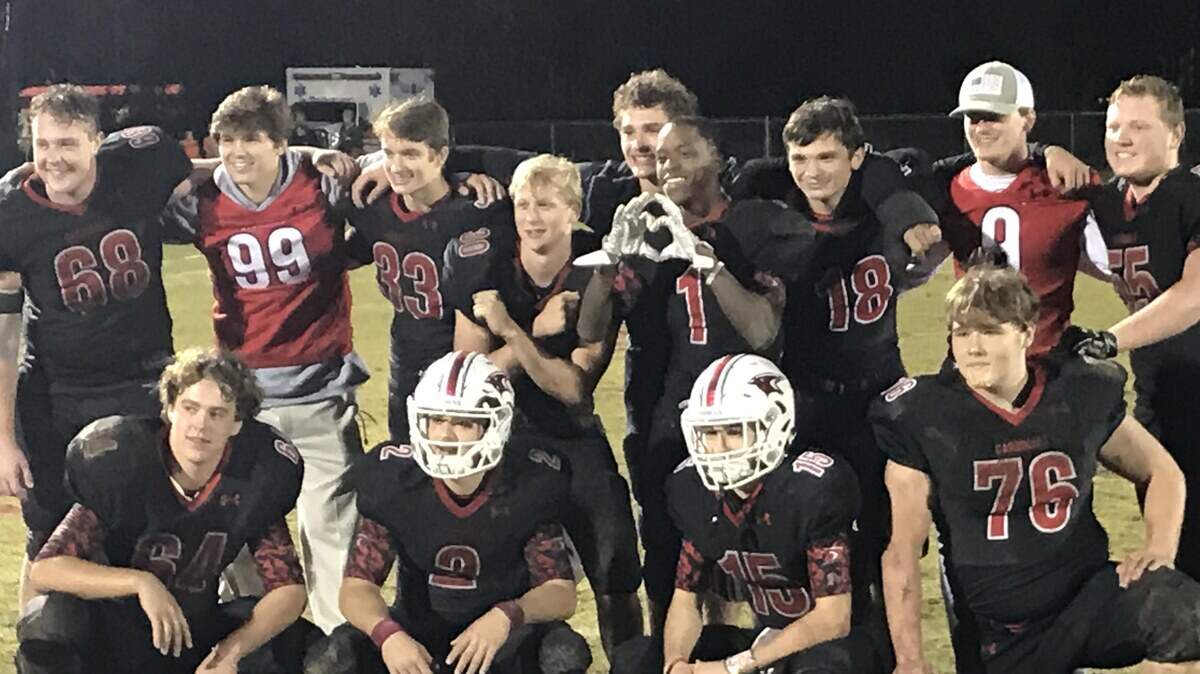 Cardinal Newman players pose for a photo after their 40-14 win over Laurence Manning on Friday, Nov. 2, in first round of SCISA 3A playoffs.