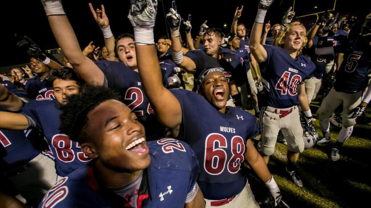 White Knoll football players celebrate after their win over Lexington in the second round of the 2016 Class 5A playoffs. Lexington and White Knoll meet Friday with third place in Region 5-5A and home playoff game up for grabs.