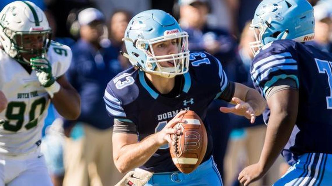 Dorman Cavaliers quarterback Hayden Lee (13) looks to pass against the Dutch Fork Silver Foxes in the 2019 Class 5A state championship game at Williams-Brice Stadium in Columbia, SC.